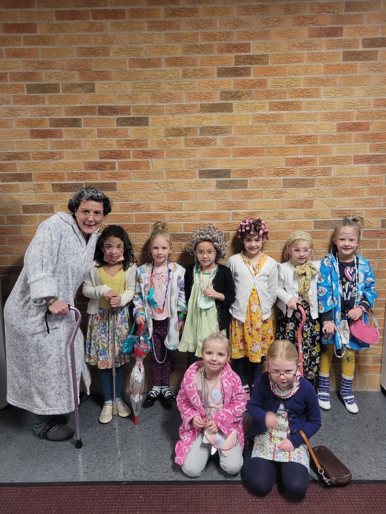 Kindergarten teacher Krystal Pratt and eight of the girls in her class are dressed as though they are 100 years old for the 100th day of school.