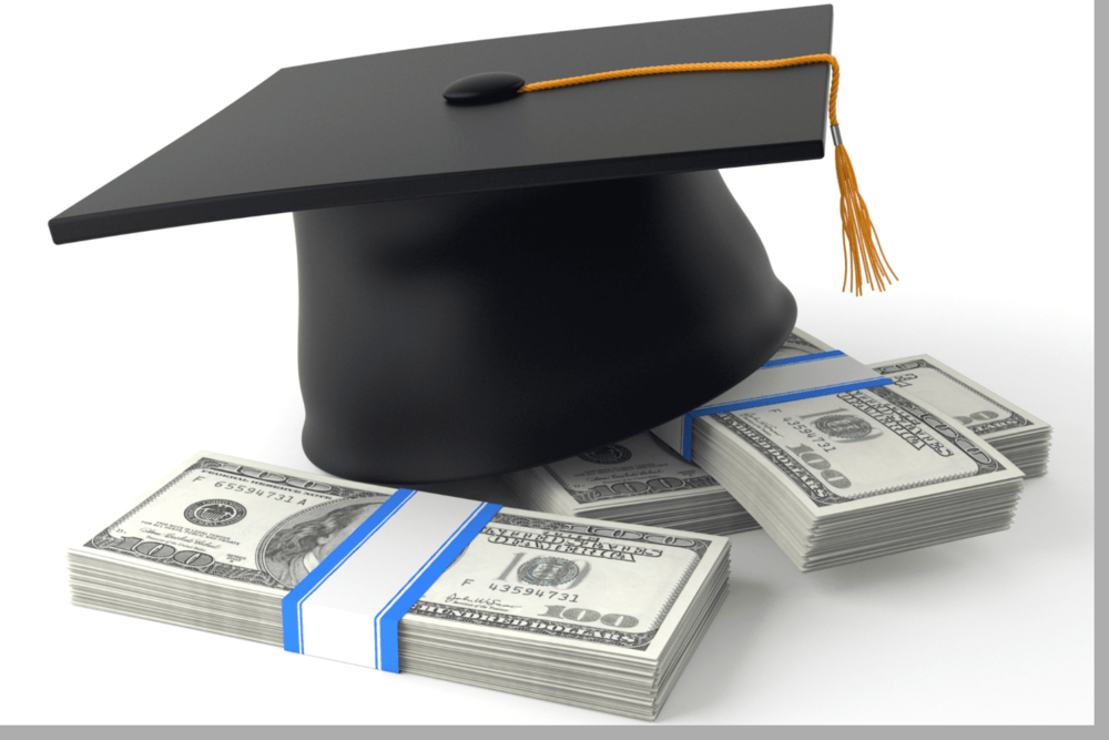 a black graduation mortarboard hat with a gold tassel sitting on 3 stacks of banded money (bills)