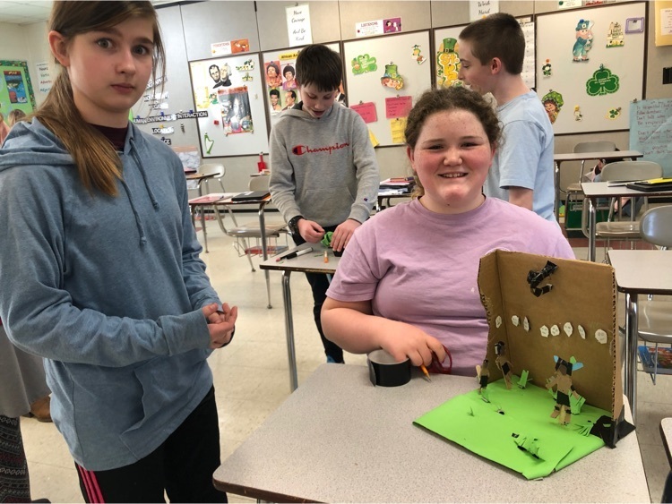 6th grade students with their projects