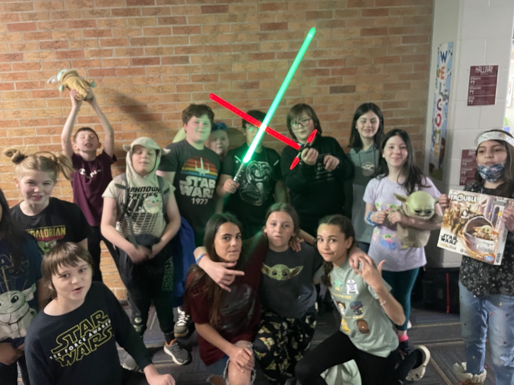 Kids posing for picture May the 4th