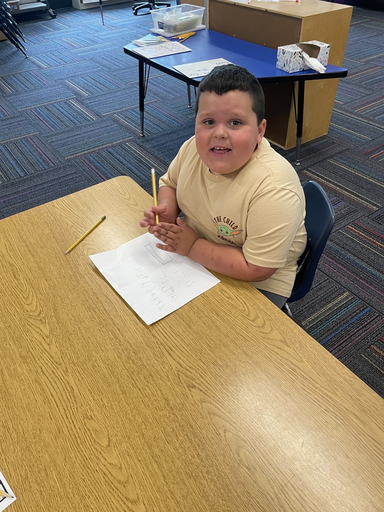 boy writing a letter