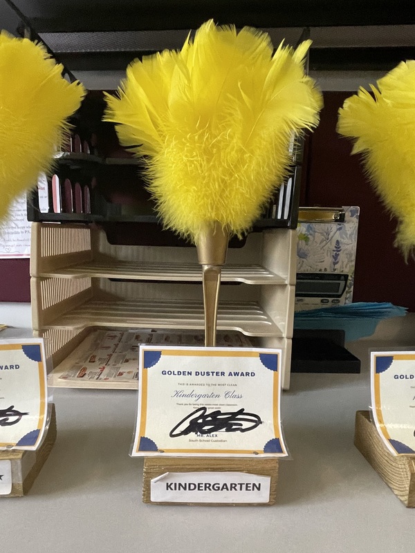 A Golden Feather Duster Award